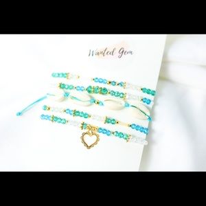 SET OF BEADED BRACELETS